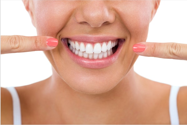 Woman pointing her smile