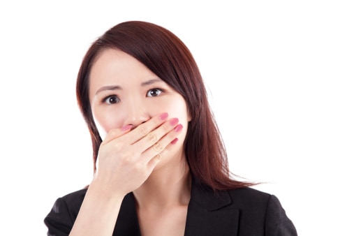 A woman surprise hiding her mouth