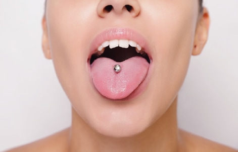woman with tongue piercing