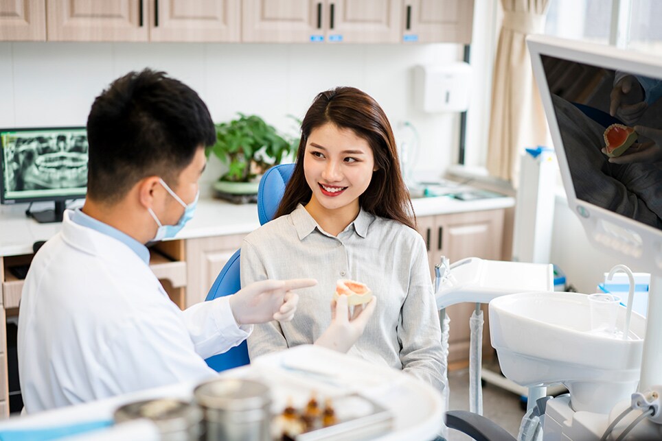 Doctor and patient discuss dental care